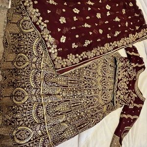 Elegant Maroon and Gold Embroidered Wedding Dress